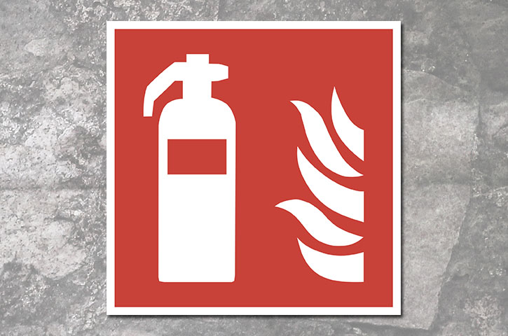 En brandskylt med en bild av en brandsläckare.